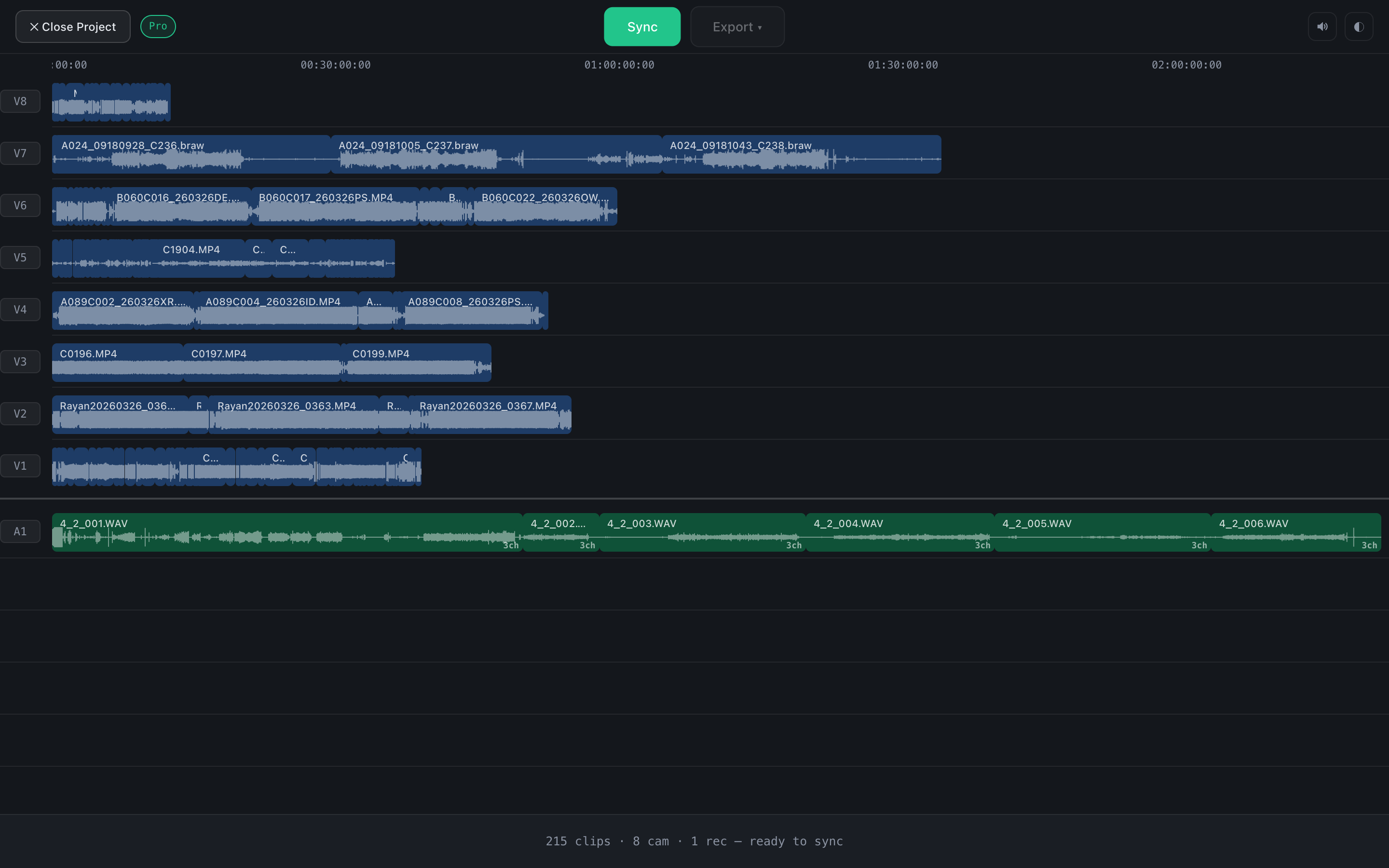 Eight cameras on shared timecode and a recorder: footage loaded, before the sync