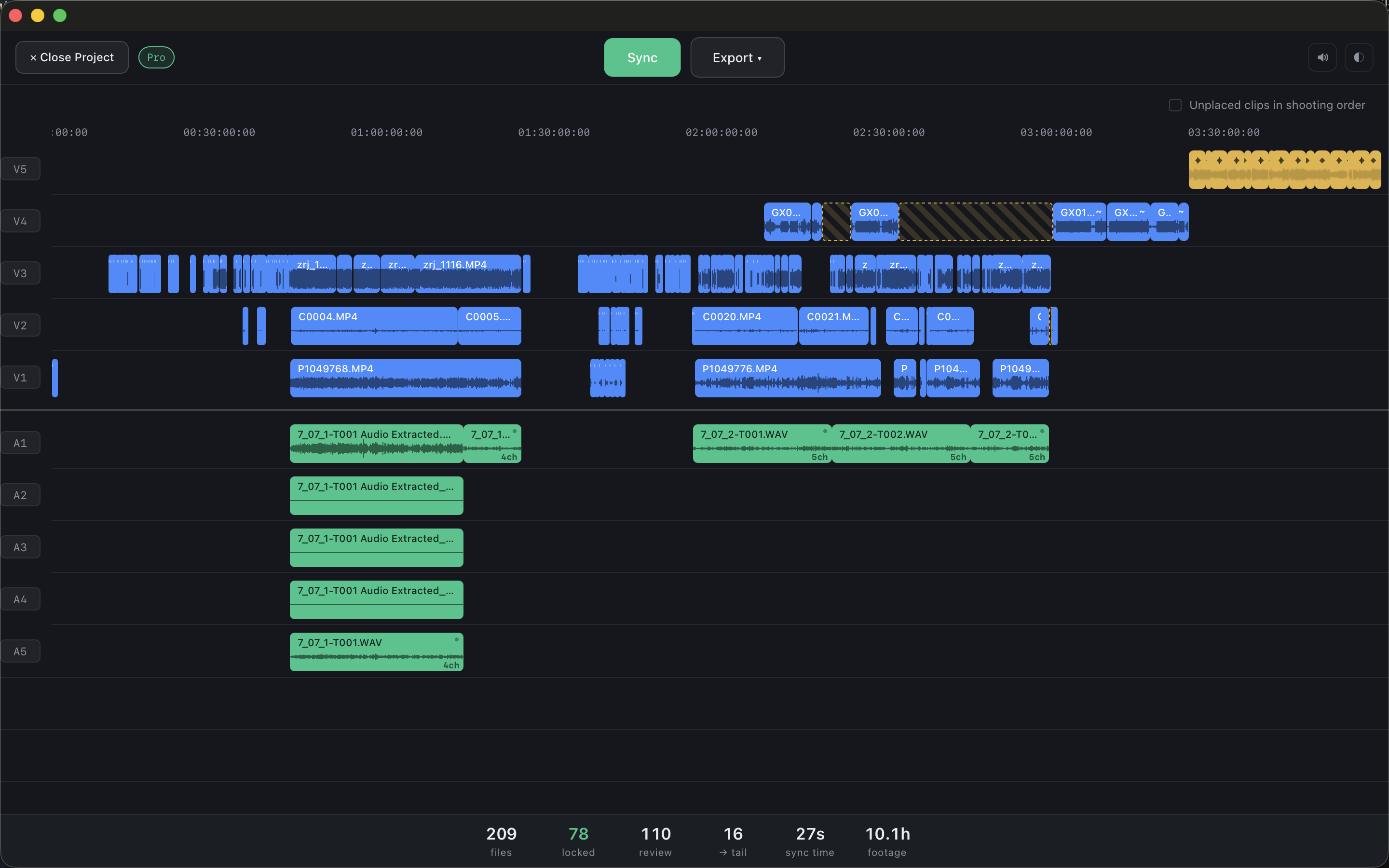 The finished timeline: each camera on its own track, recorder channels below, unsynced material in gold